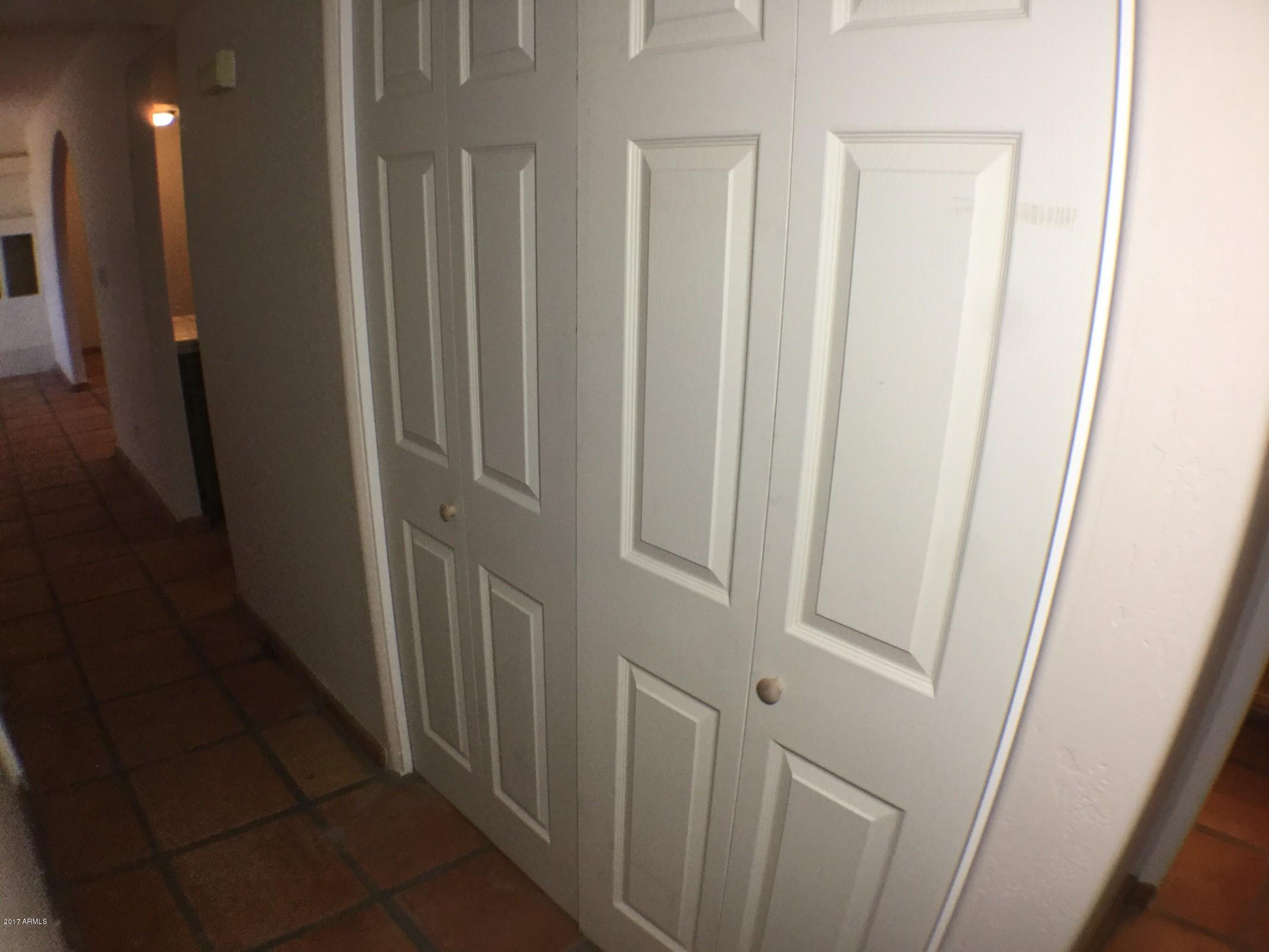 13816 South Kiva Road Buckeye, AZ 85326 - Photo 15 of 31 hallway closets
