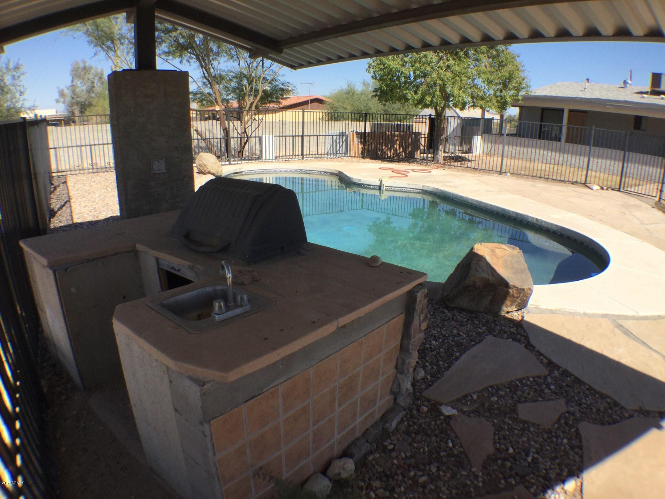 13816 South Kiva Road Buckeye, AZ 85326 - Photo 26 of 31 pool and bbq