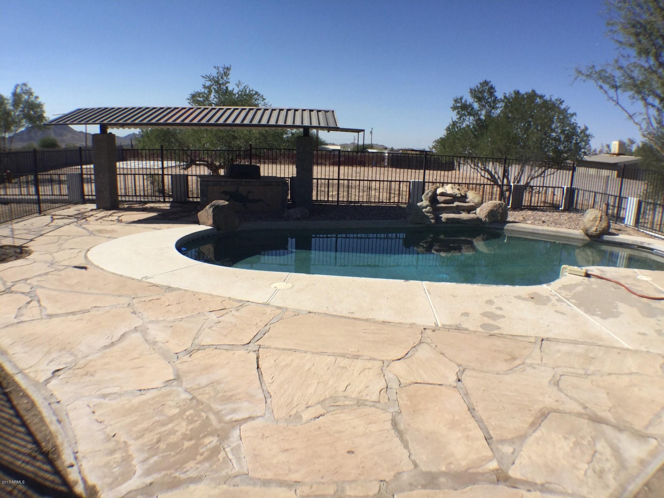 13816 South Kiva Road Buckeye, AZ 85326 - Photo 27 of 31 pool to back yard