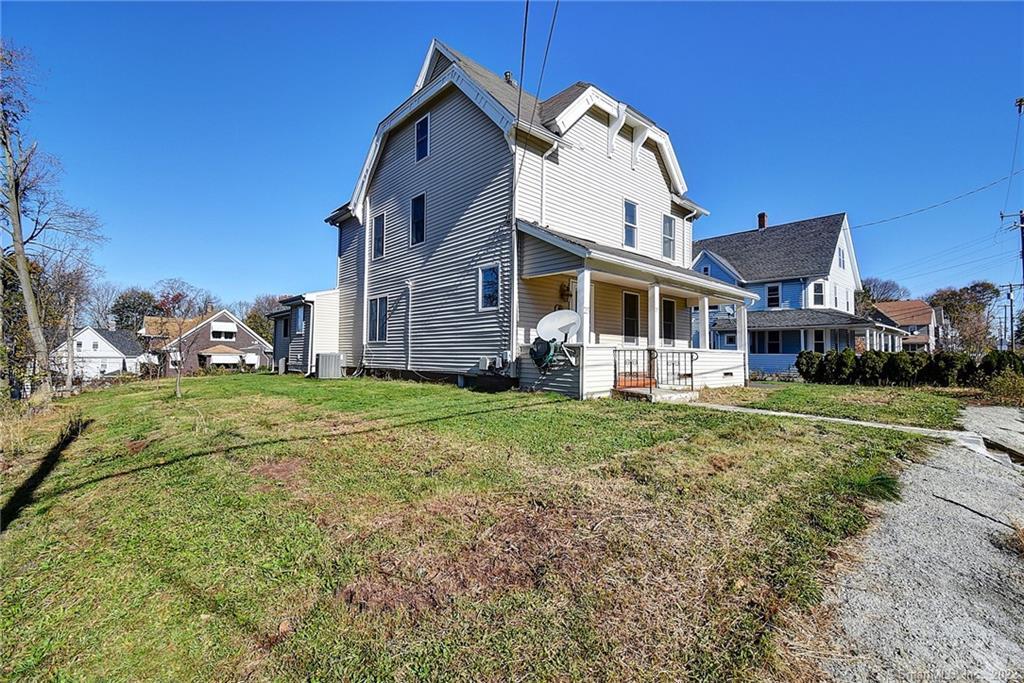 25 Wadsworth Street Manchester, CT 06040 - Photo 1 of 1 a view of a house with a yard