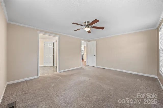 a view of a big room with carpet