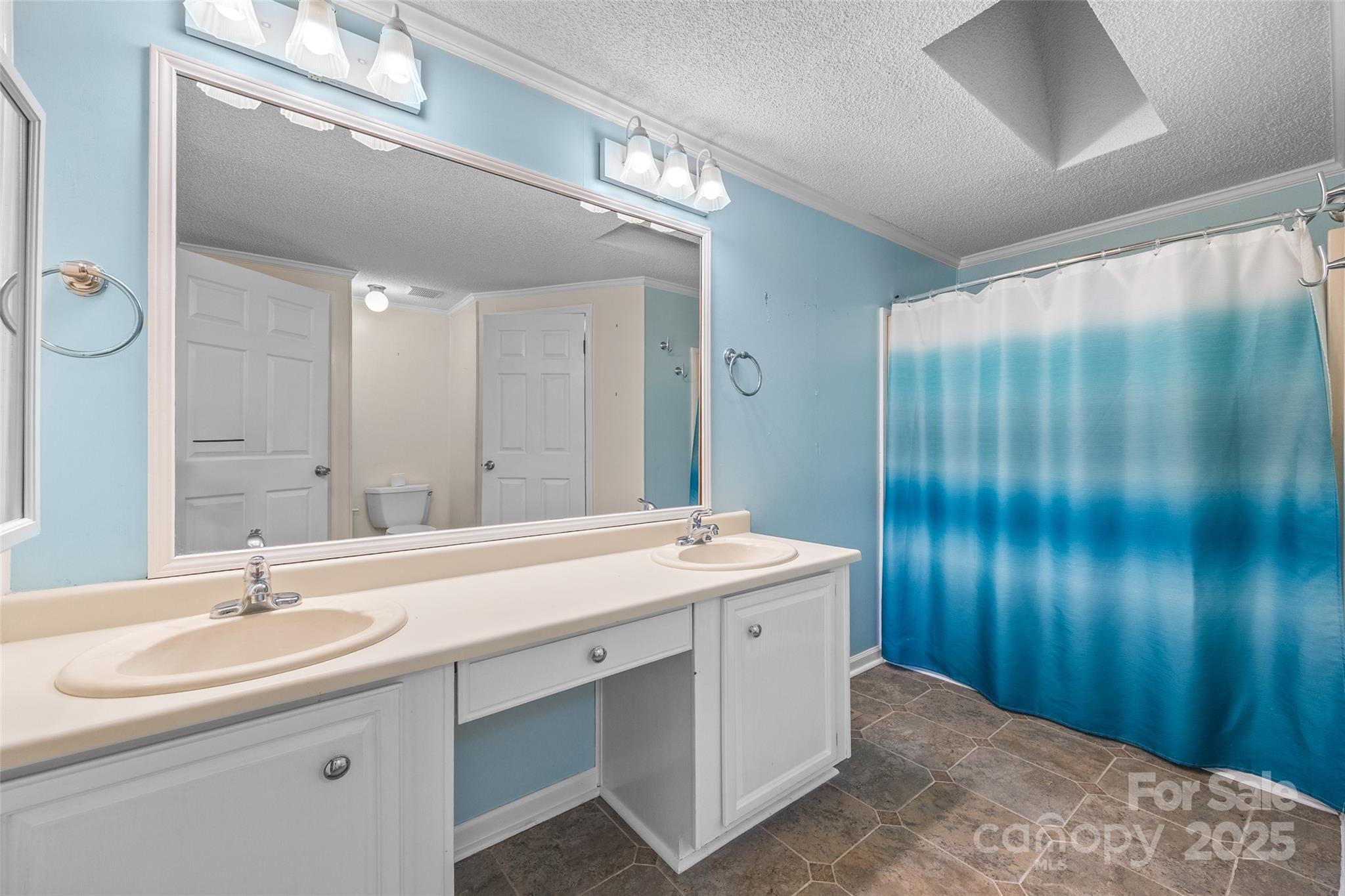 4640 Mel Nunnery Road Fort Lawn, SC 29714 - Photo 16 of 37 a bathroom with a sink double vanity and a mirror