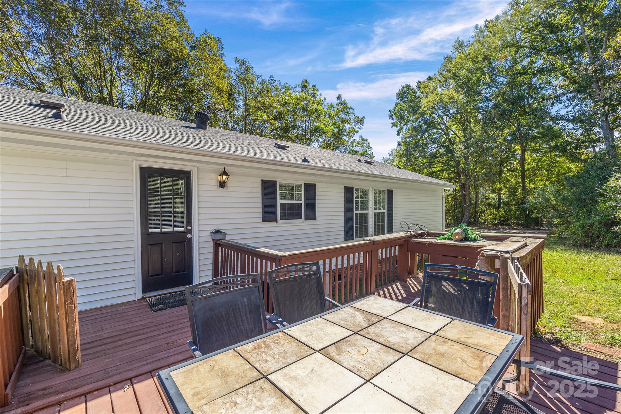 4640 Mel Nunnery Road Fort Lawn, SC 29714 - Photo 28 of 37 a view of house with wooden deck and furniture