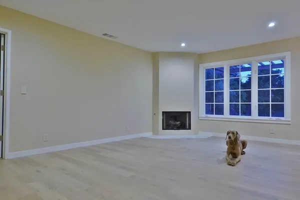 a kitchen with a sink and a window