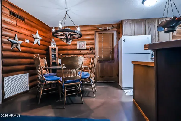 a view of storage and utility room with stairs