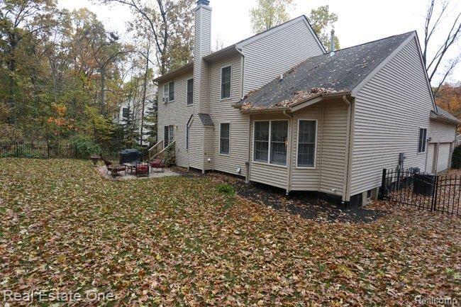 565 Timber Ridge Drive Highland, MI 48357 - Photo 44 of 55 Rear View