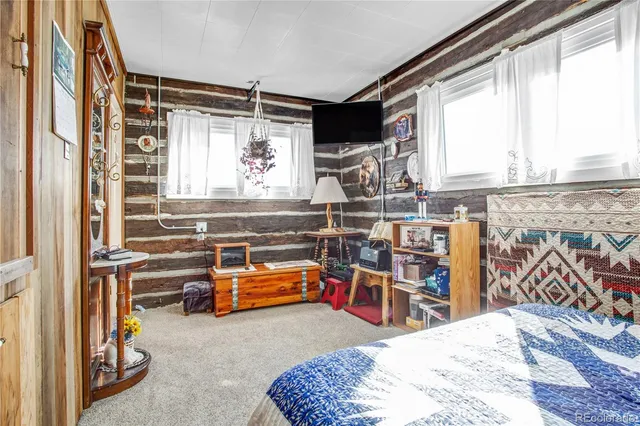 a room with furniture and a window