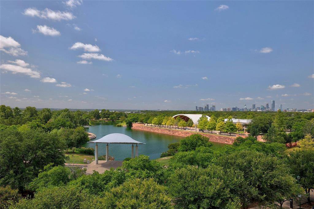 1701 Simond Avenue, Unit 301 Austin, TX 78723 - Photo 21 of 26 a view of a house with a yard and a pool