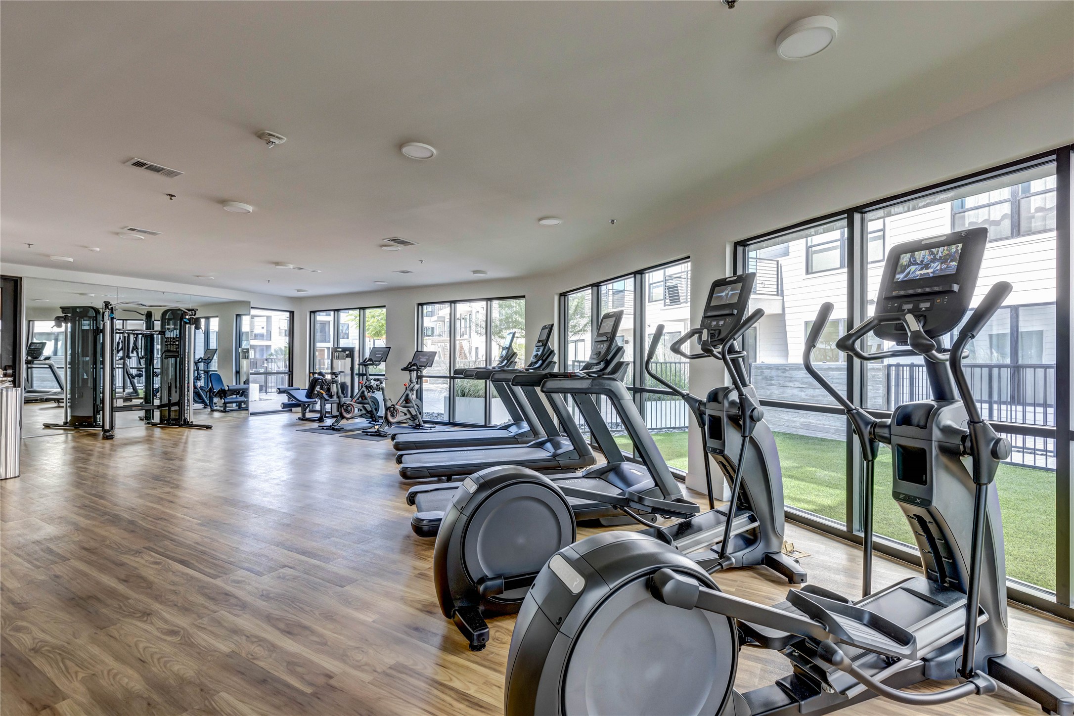 1701 Simond Avenue, Unit 301 Austin, TX 78723 - Photo 24 of 26 a view of a room with gym equipment