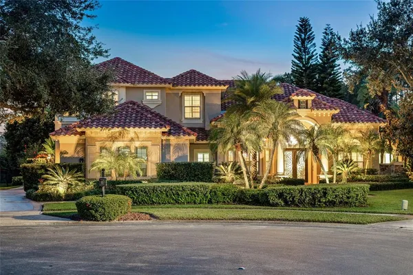 a view of a big yard in front of a house