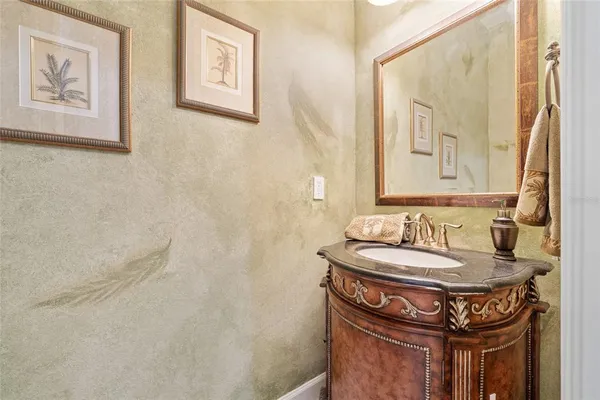 a spacious bedroom with a bed and a flat screen tv