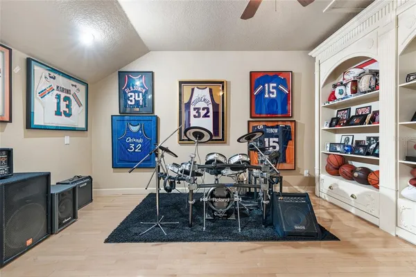 a living room filled with furniture and a large window