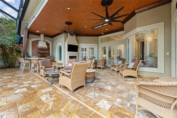 an aerial view of residential house with outdoor space and swimming pool