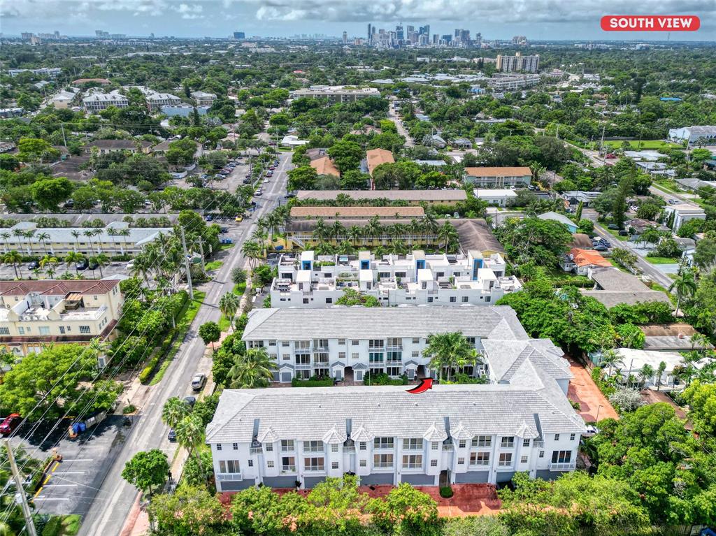 2725 Northeast 8th Avenue, Unit 113 Wilton Manors, FL 33334 - Photo 70 of 72 an aerial view of a city