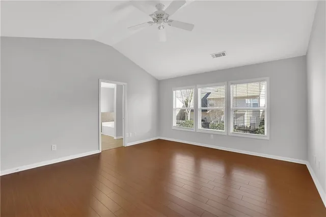 a bathroom with a tub sink and window