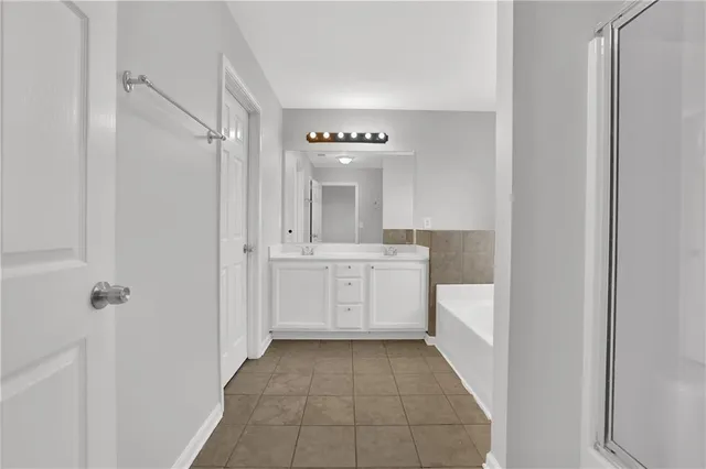 a view of a dining room with furniture wooden floor and chandelier