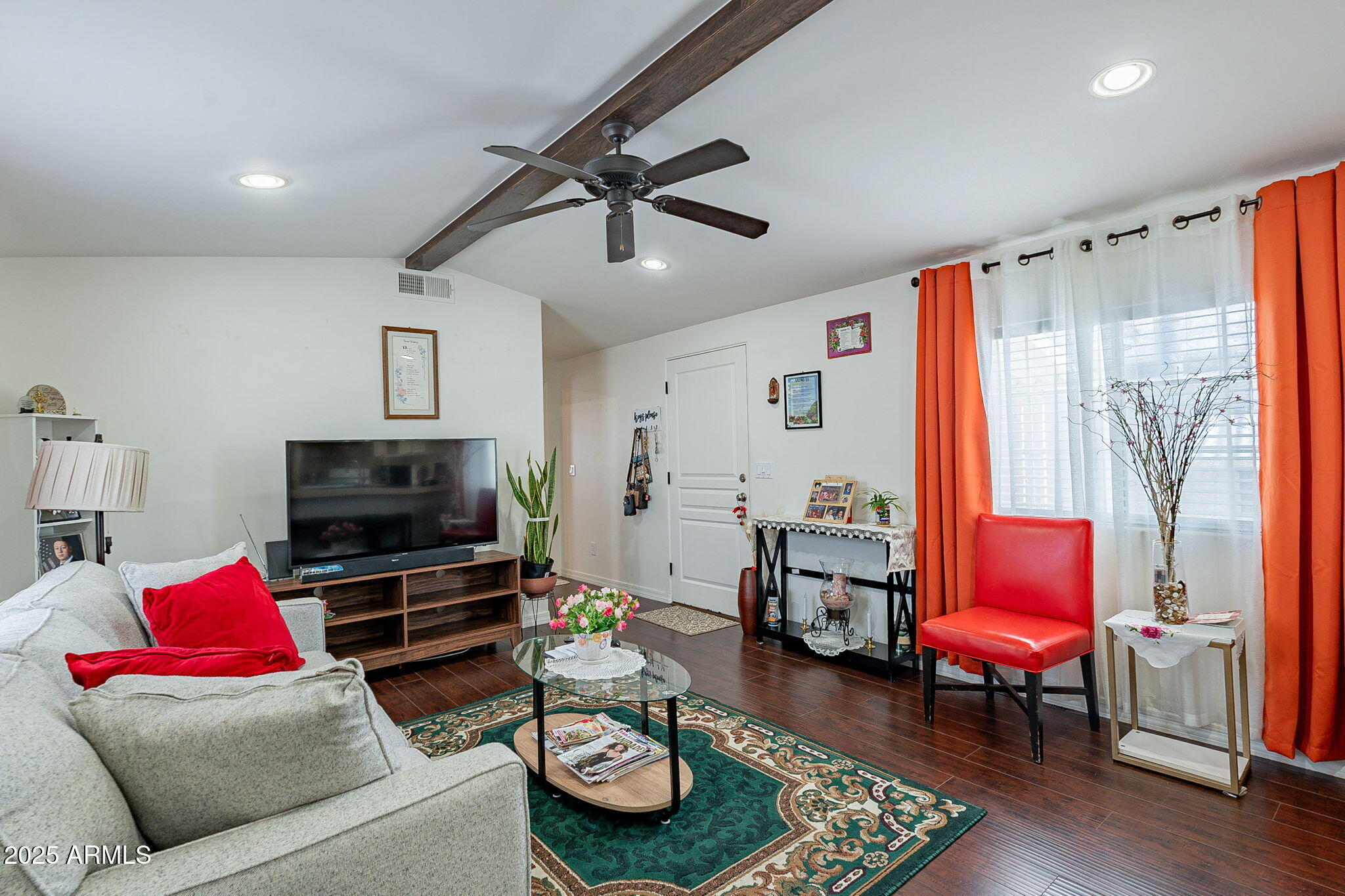 15606 South Gilbert Road, Unit 63 Chandler, AZ 85225 - Photo 6 of 21 a living room with furniture and a flat screen tv