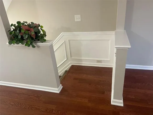 a view of entryway with wooden floor