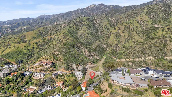 a view of mountain view with lots of bushes