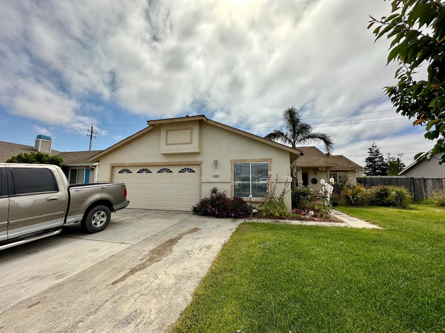 1060 Viewpointe Street Soledad, CA 93960 - Photo 2 of 11 a view of a house with a big yard and sitting area
