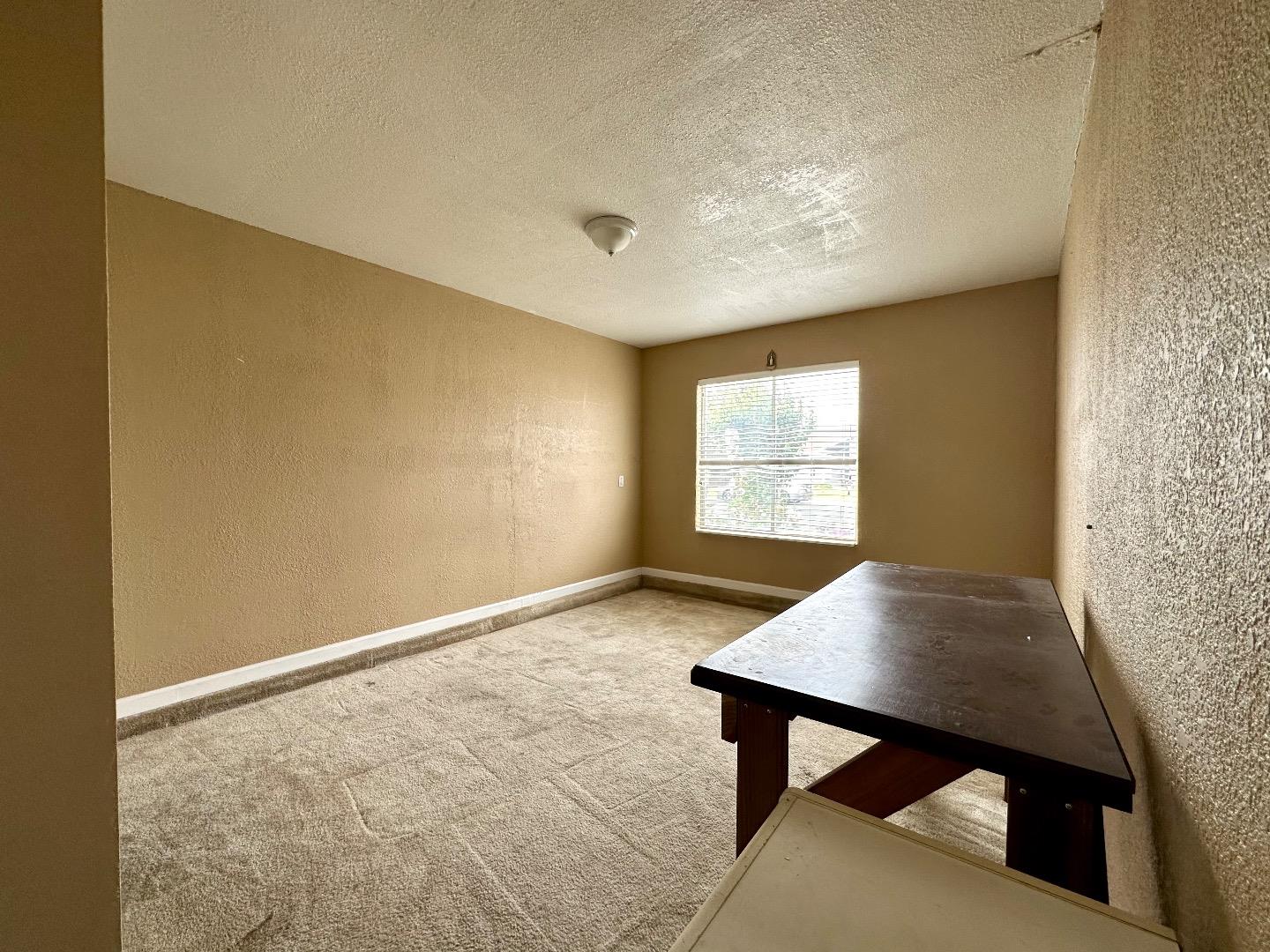 1060 Viewpointe Street Soledad, CA 93960 - Photo 9 of 11 a workspace with furniture and window