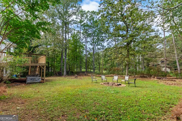 a view of a park with swings and slides