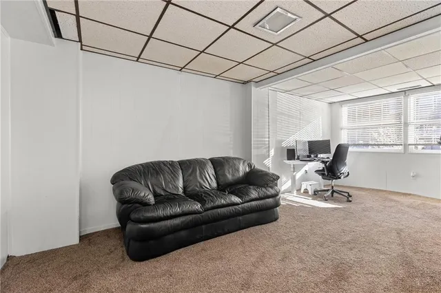 a living room with a couch and a table