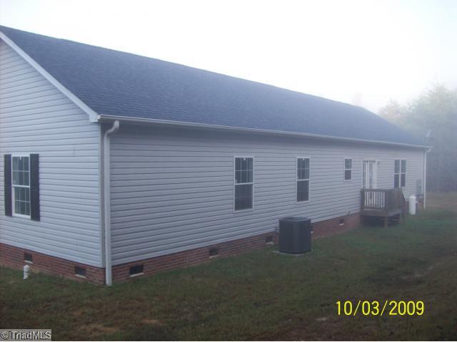 261 Dan River Road Madison, NC 27025 - Photo 2 of 14 Exterior Back.