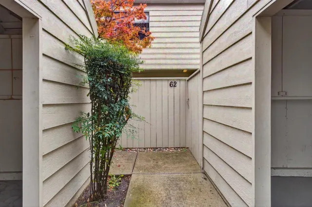 a view of a house with a flower garden