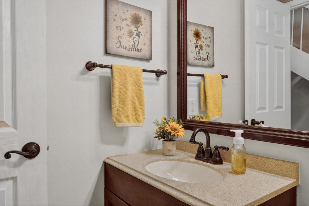 750 Lincoln Road, Unit 62 Yuba City, CA 95991 - Photo 18 of 56 a bathroom with a sink and a mirror