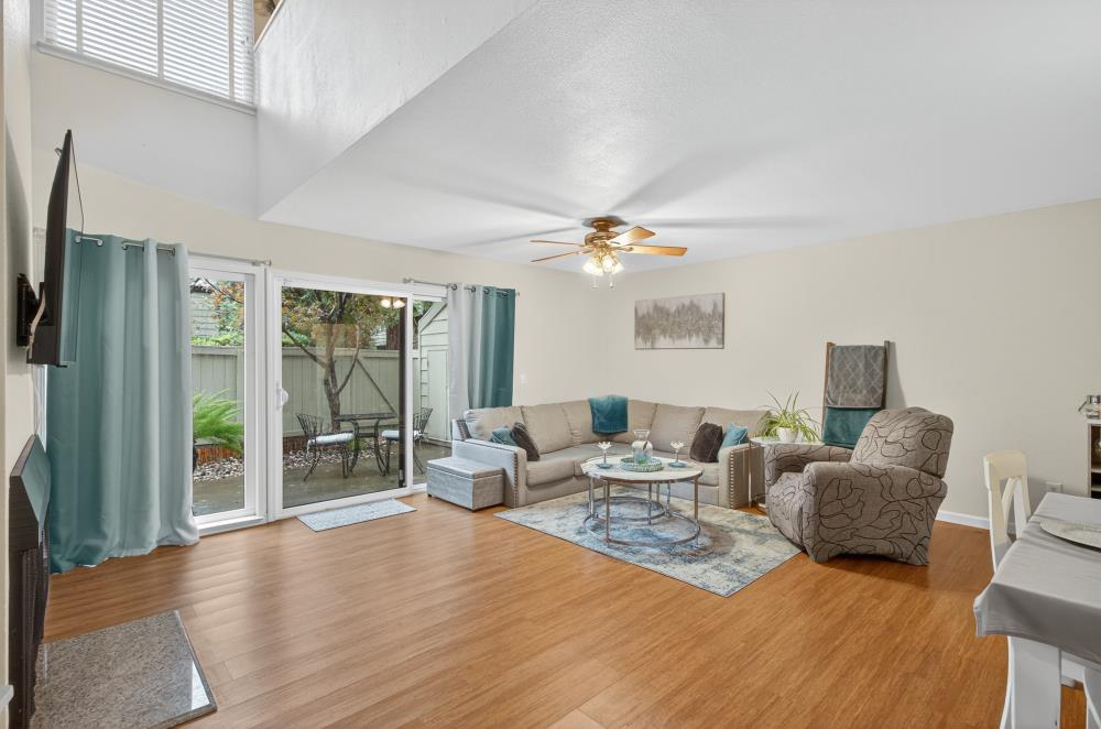 750 Lincoln Road, Unit 62 Yuba City, CA 95991 - Photo 20 of 56 a living room with furniture and a flat screen tv