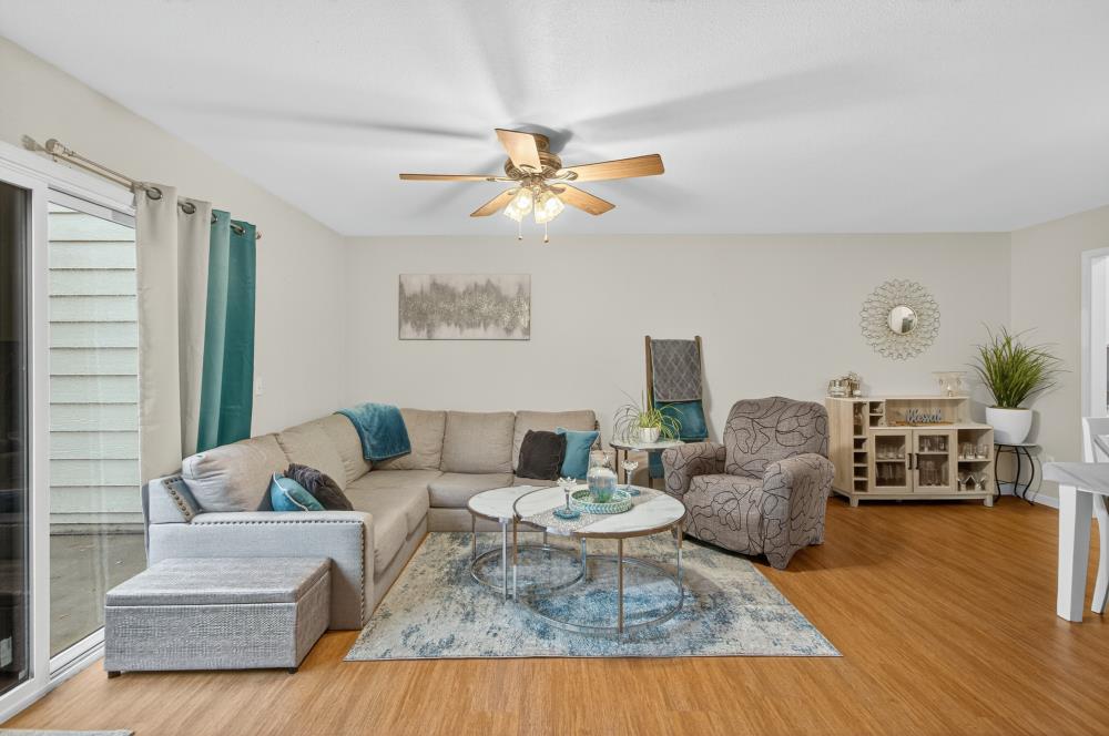 750 Lincoln Road, Unit 62 Yuba City, CA 95991 - Photo 24 of 56 a living room with furniture or couch and a potted plant