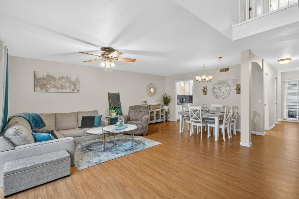 750 Lincoln Road, Unit 62 Yuba City, CA 95991 - Photo 25 of 56 a living room with furniture dining table and a fireplace