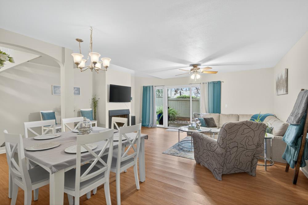 750 Lincoln Road, Unit 62 Yuba City, CA 95991 - Photo 29 of 56 a view of a dining room with furniture and wooden floor