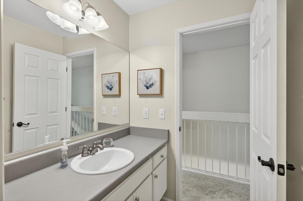 750 Lincoln Road, Unit 62 Yuba City, CA 95991 - Photo 40 of 56 a bathroom with a sink a mirror and a shower