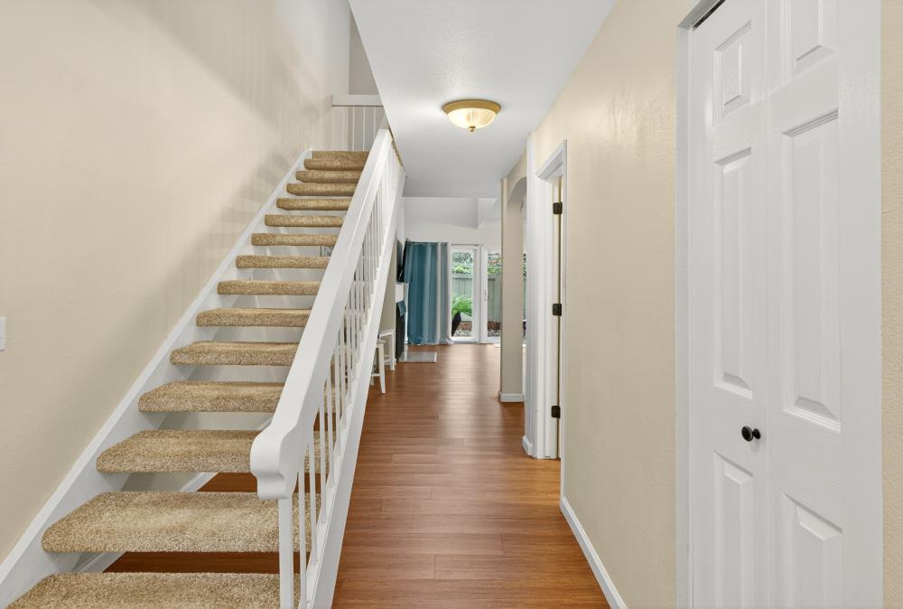 750 Lincoln Road, Unit 62 Yuba City, CA 95991 - Photo 5 of 56 a view of a hallway with wooden floor and entryway