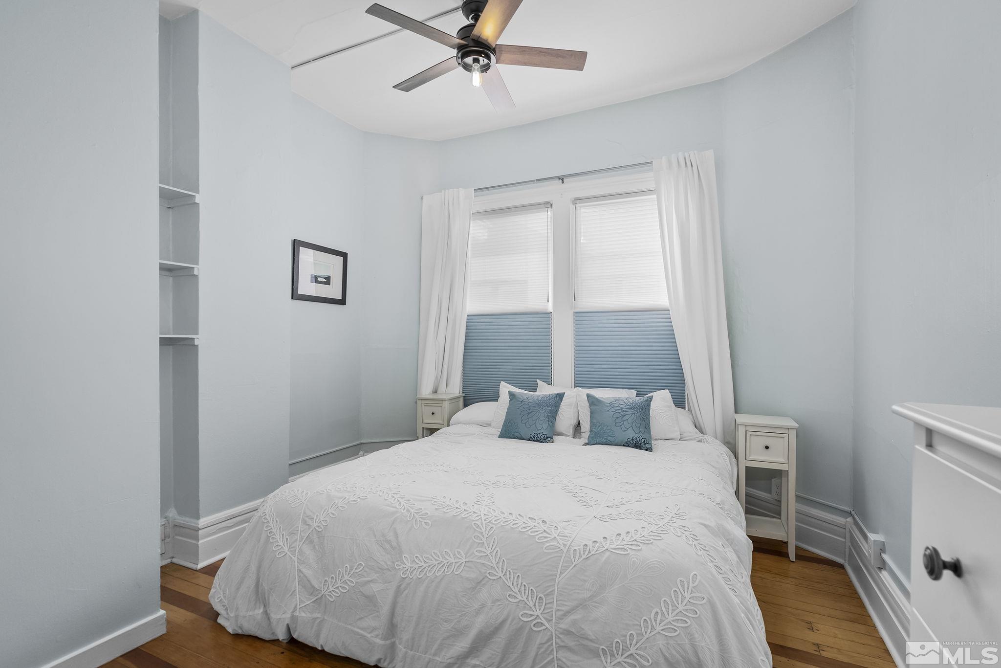 546 Sinclair Street Reno, NV 89501 - Photo 13 of 27 a bedroom with a bed and a window