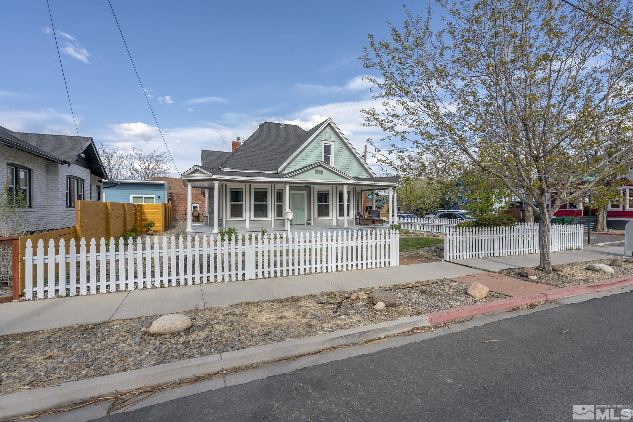 546 Sinclair Street Reno, NV 89501 - Photo 2 of 27 a front view of a house with a garden