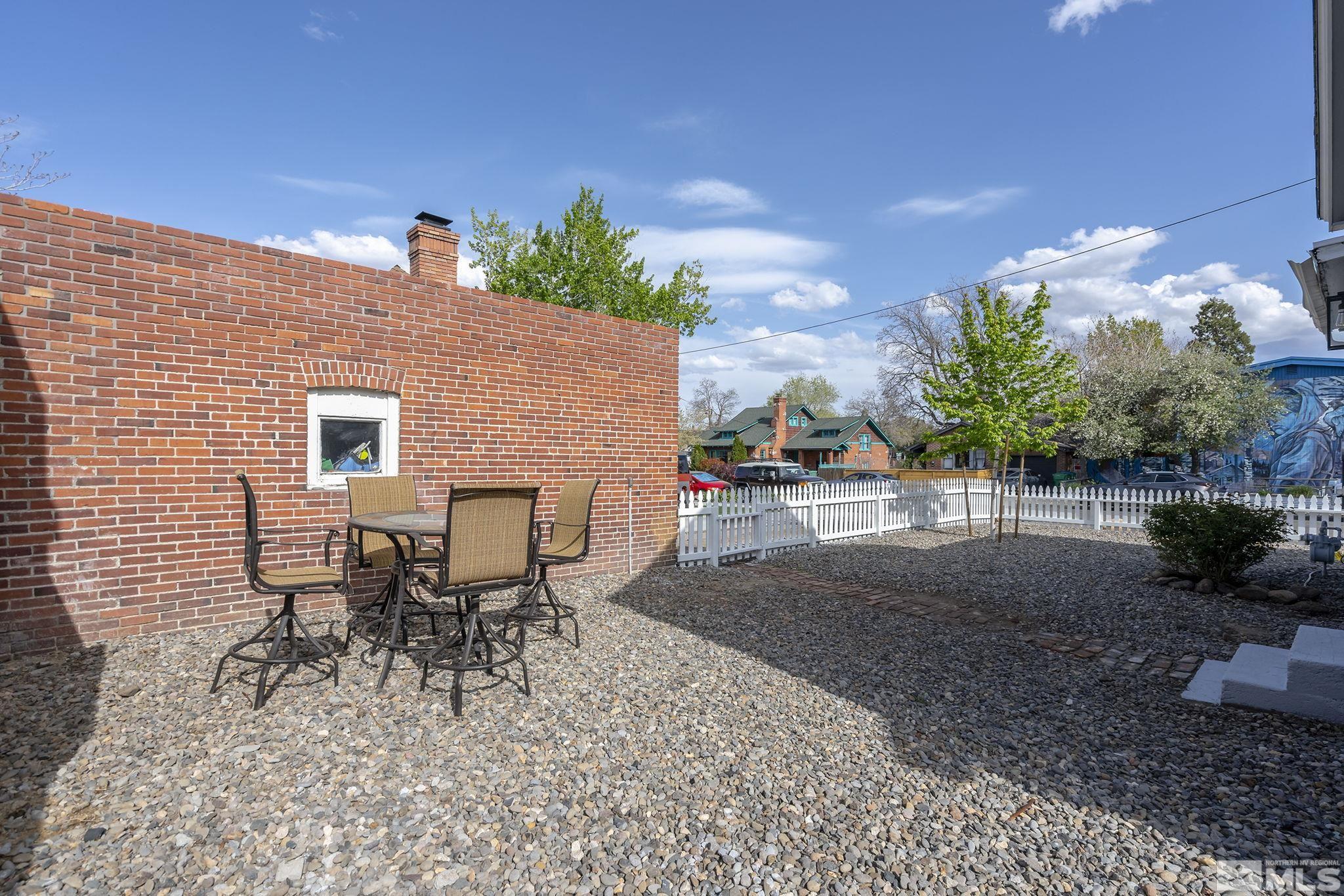 546 Sinclair Street Reno, NV 89501 - Photo 21 of 27 a backyard of a house with outdoor seating