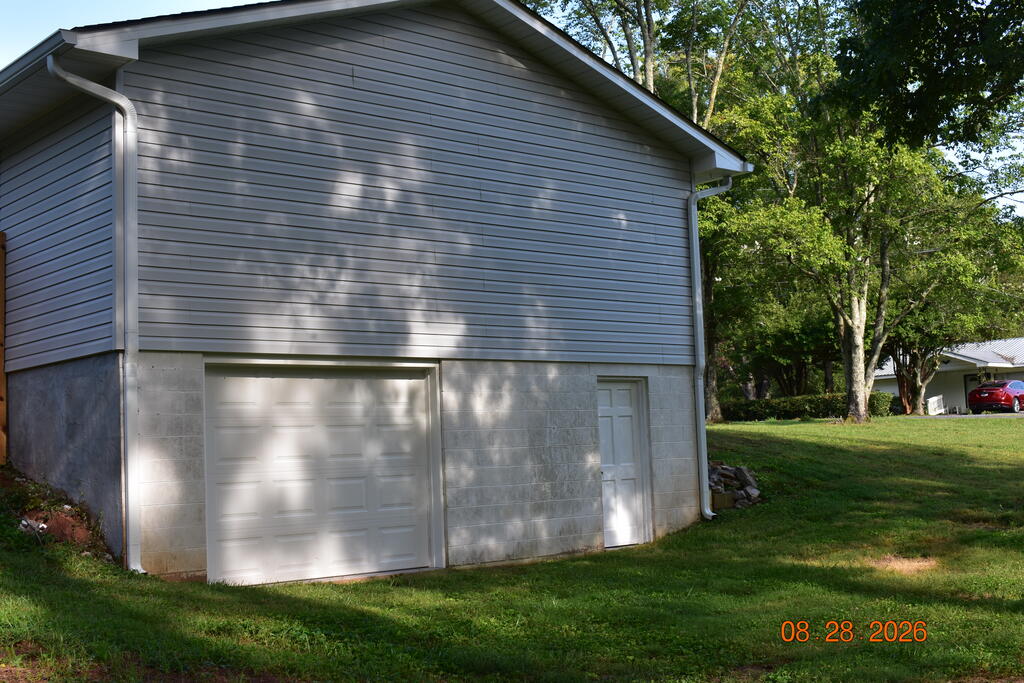 171 Farrar Road Cohutta, GA 30710 - Photo 6 of 24 Basement side of house, New garage door