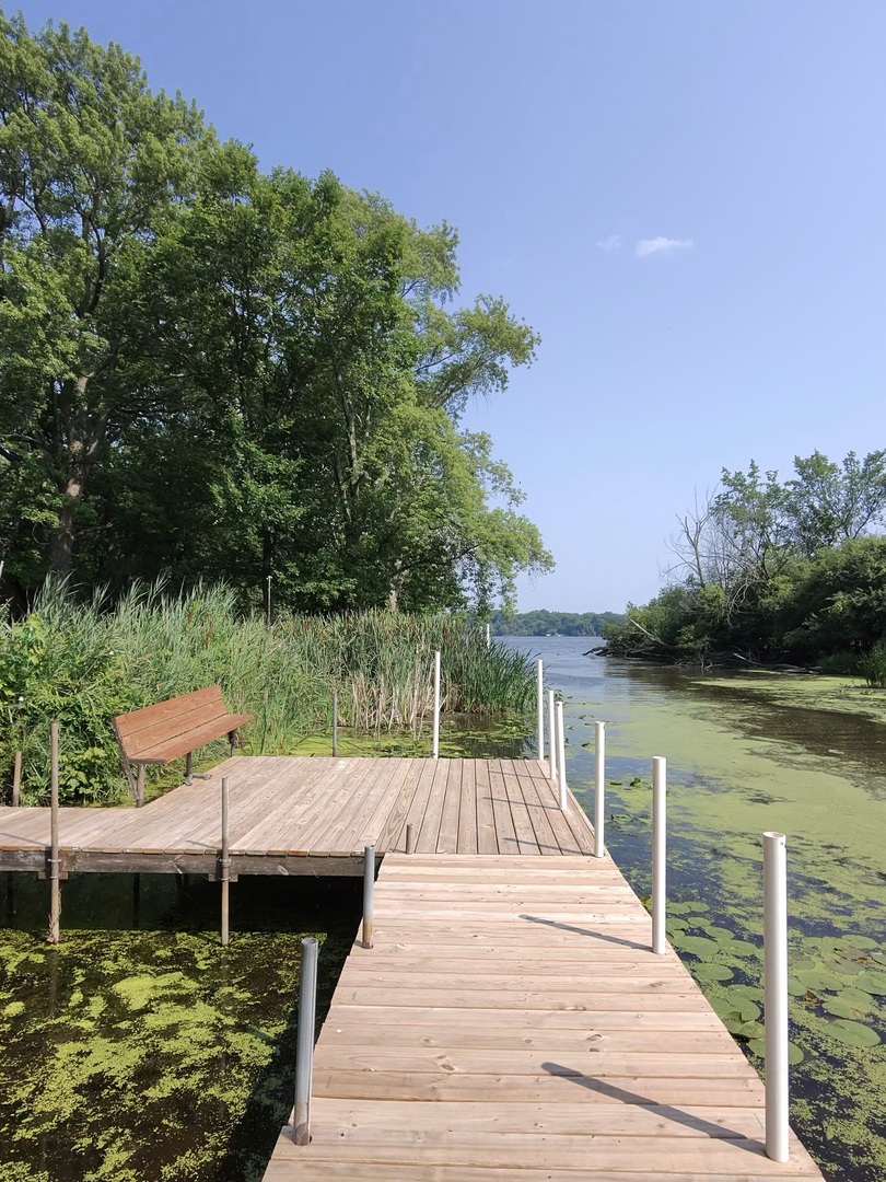 27849 West Lakeshore Drive Spring Grove, IL 60081 - Photo 14 of 15 a wooden view of a lake