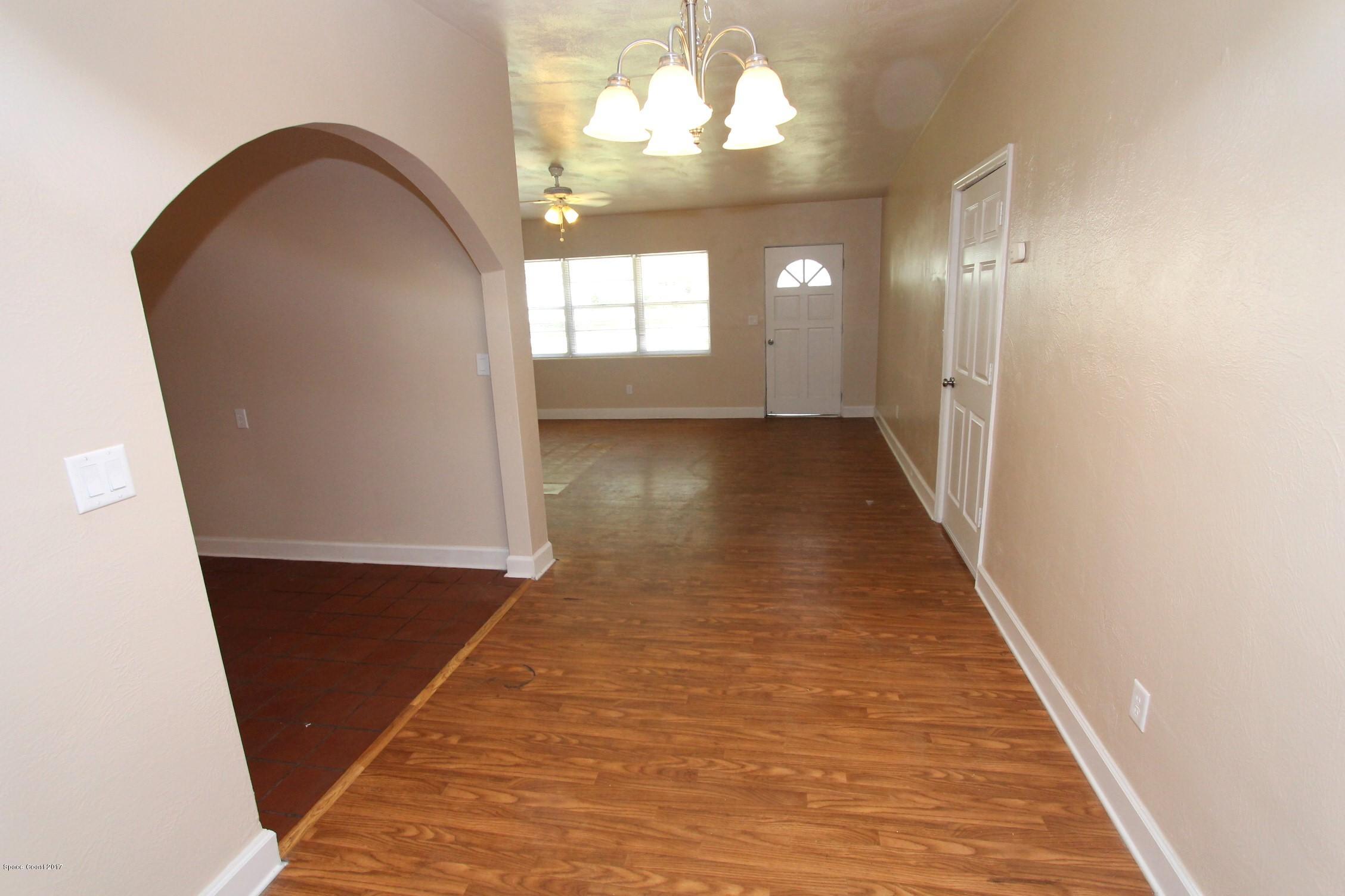 2509 Gulfstream Road, Unit 1 Orlando, FL 32805 - Photo 11 of 48 Archway out of kitchen