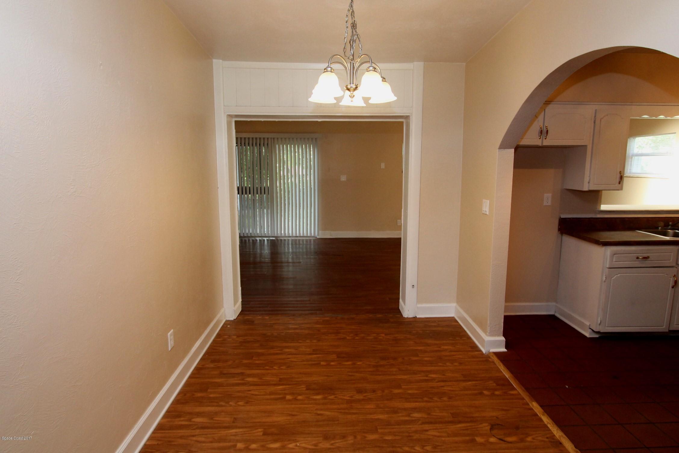 2509 Gulfstream Road, Unit 1 Orlando, FL 32805 - Photo 7 of 48 Hallway to bonus room & Kitchen