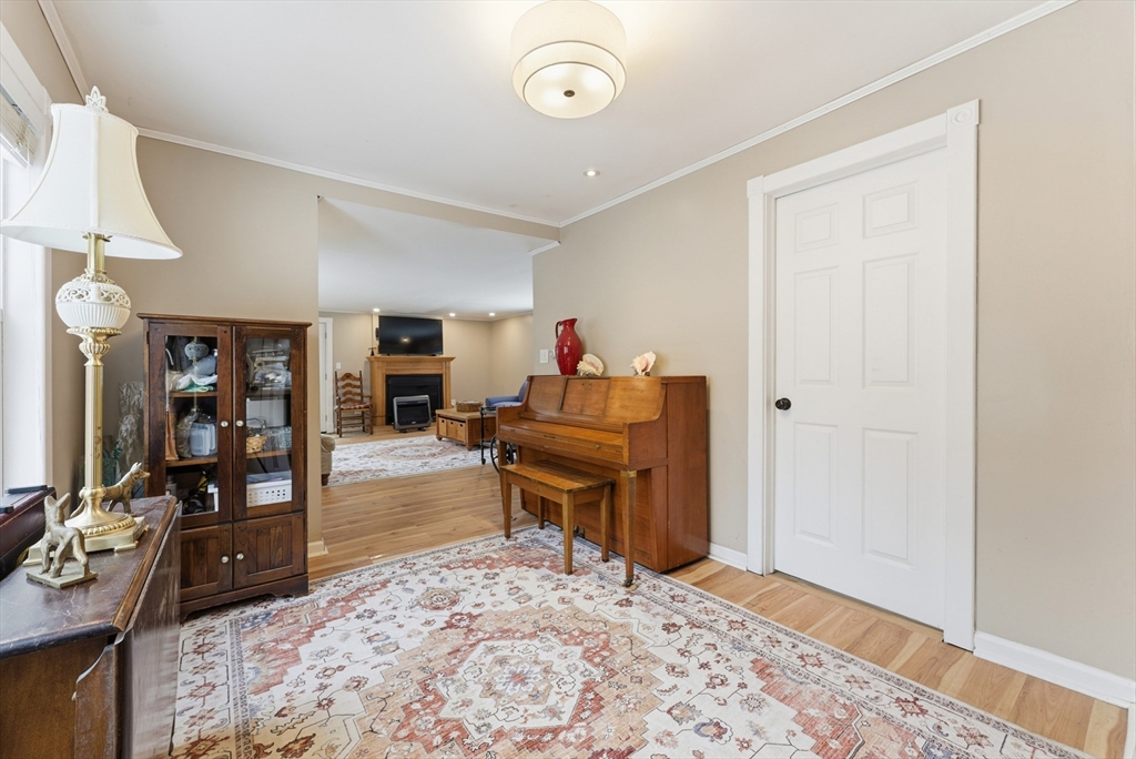 45 Pike Street Athol, MA 01331 - Photo 11 of 38 a living room with furniture a rug and a window