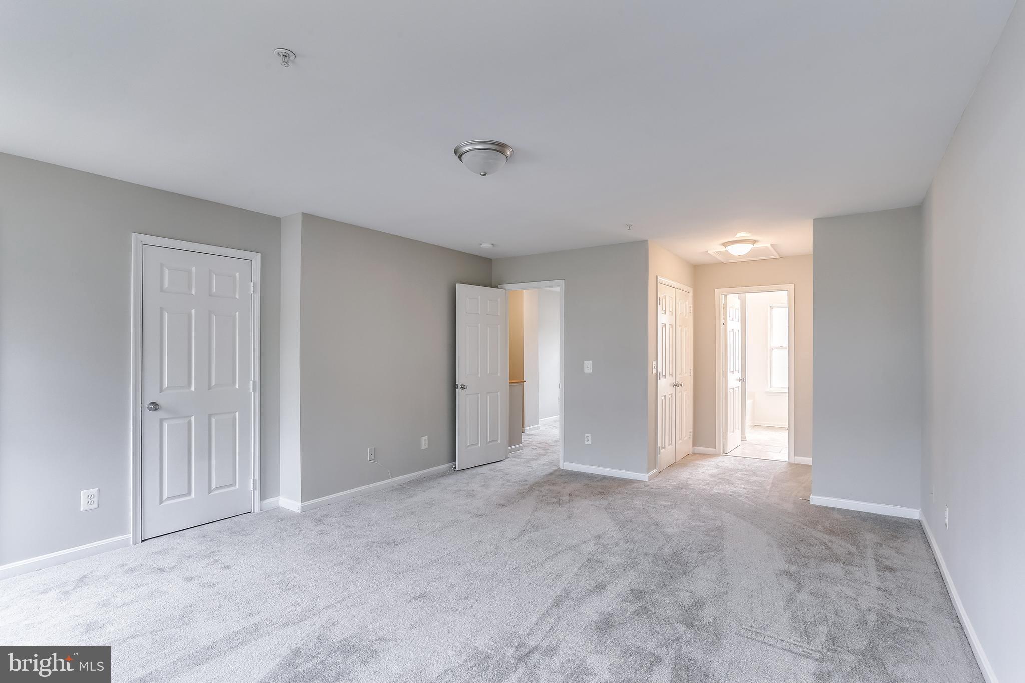 673 Hunting Fields Road Baltimore, MD 21220 - Photo 17 of 31 a view of an empty room with glass door