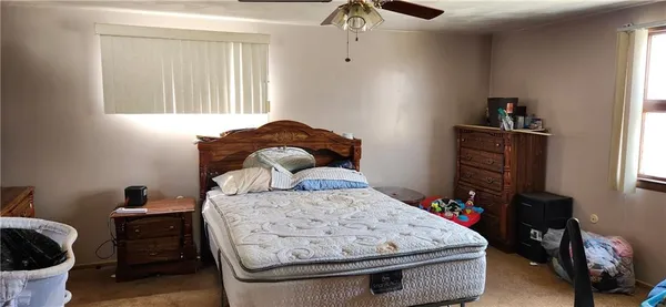 a room with toys and dresser