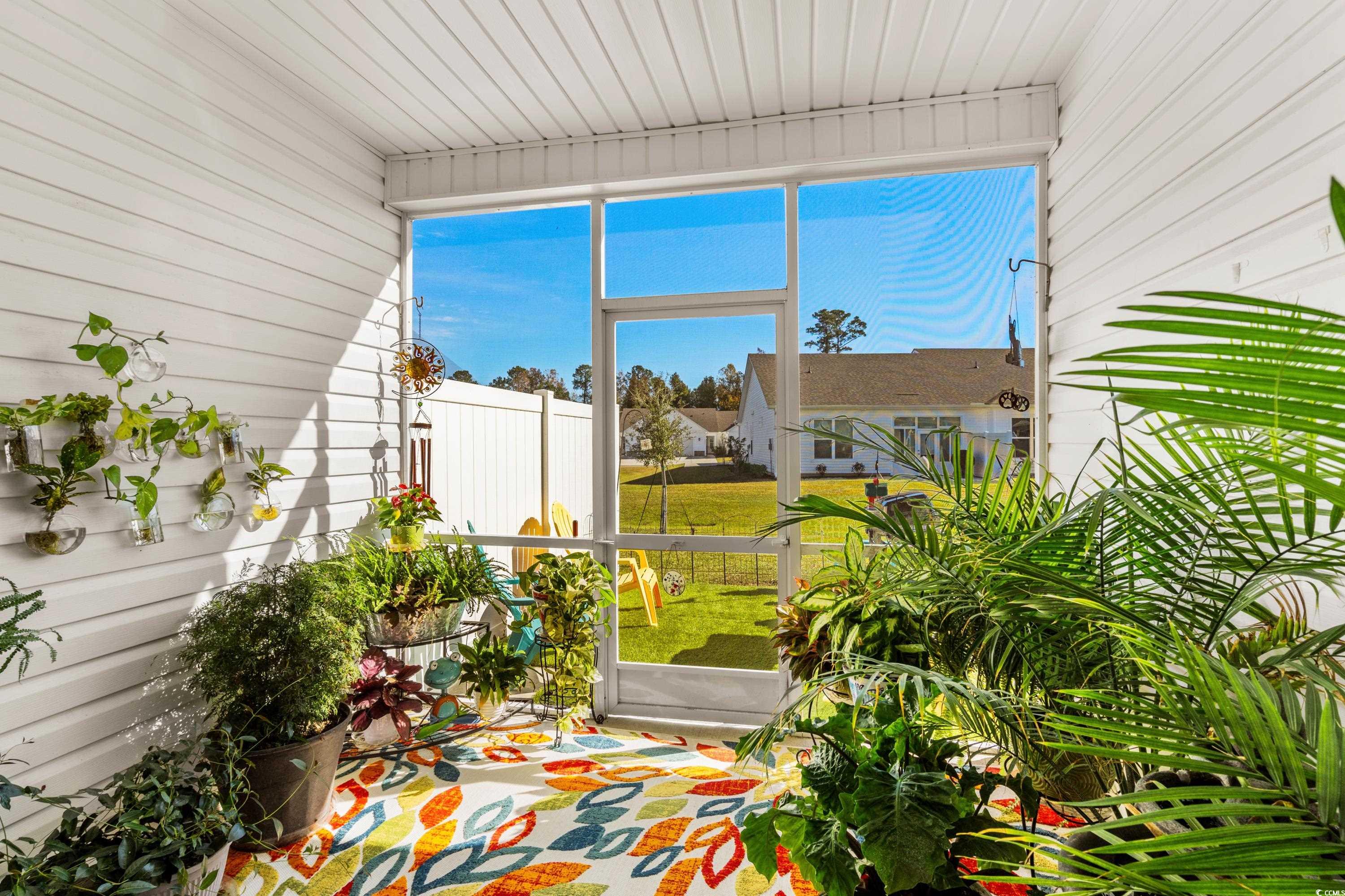 4036 D Taranto Loop, Unit 5404D Myrtle Beach, SC 29579 - Photo 18 of 39 View of sunroom