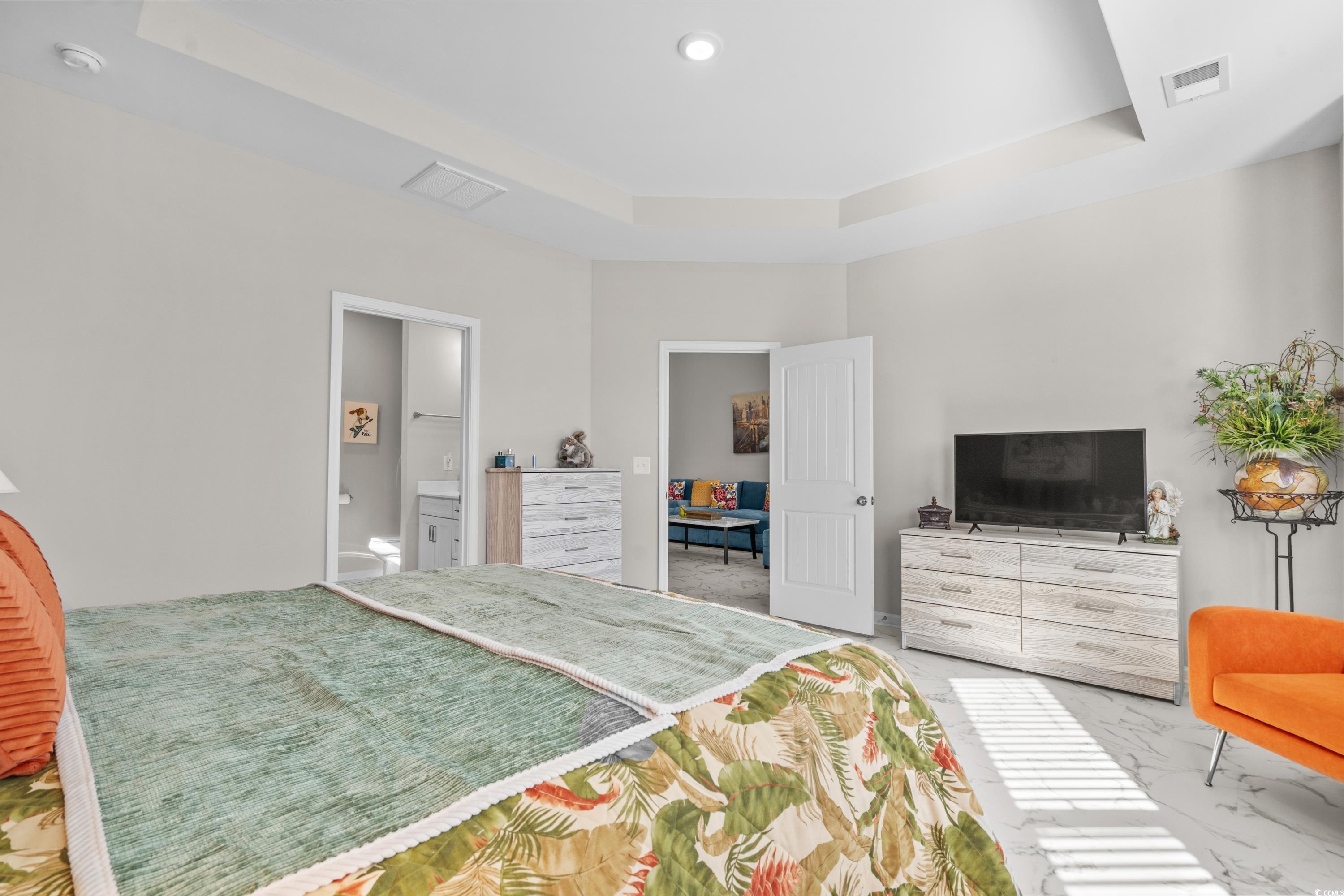 4036 D Taranto Loop, Unit 5404D Myrtle Beach, SC 29579 - Photo 26 of 39 Bedroom featuring ensuite bathroom and a raised ce