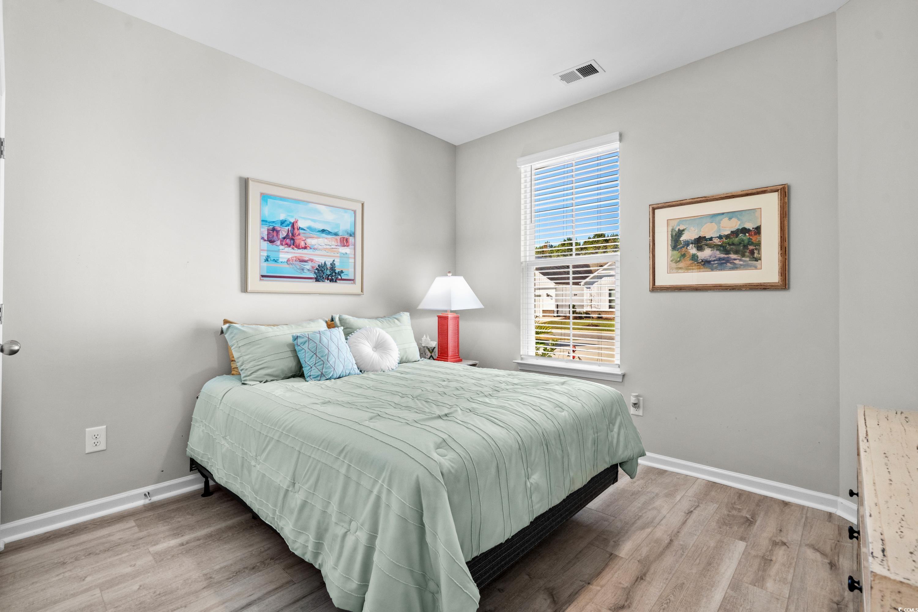 4036 D Taranto Loop, Unit 5404D Myrtle Beach, SC 29579 - Photo 30 of 39 Bedroom with light hardwood / wood-style flooring