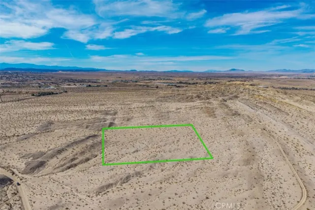 a view of a yard with an ocean space